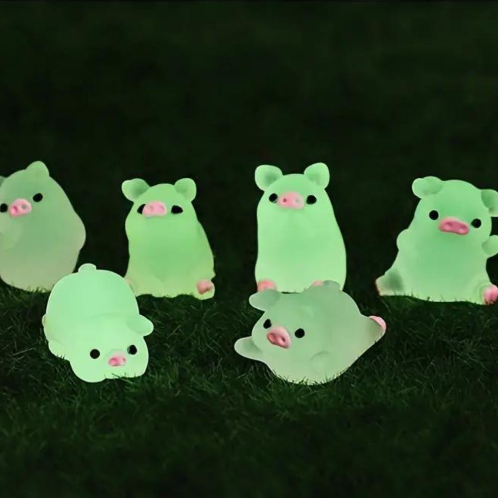 Kit 6 Mini Porquinhos Luminosos – Brilham no Escuro em Poses Diferentes